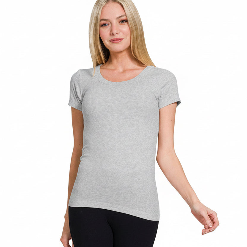Woman wearing a heather grey t-shirt on a white background
